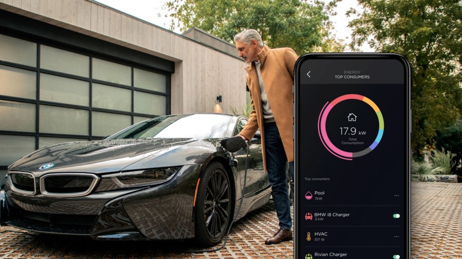 Man charging his electric vehicle overlaid by a smartphone with Savant Power interface 